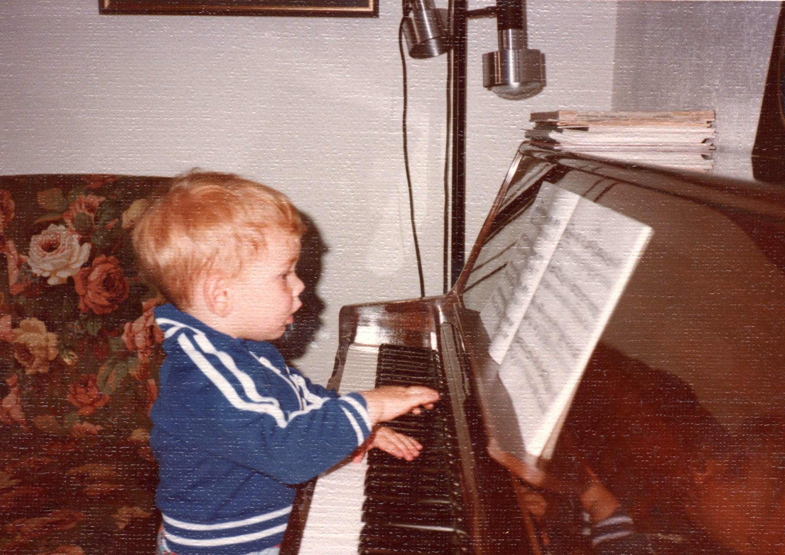 Nick at an early age playing his Grandmars Piano